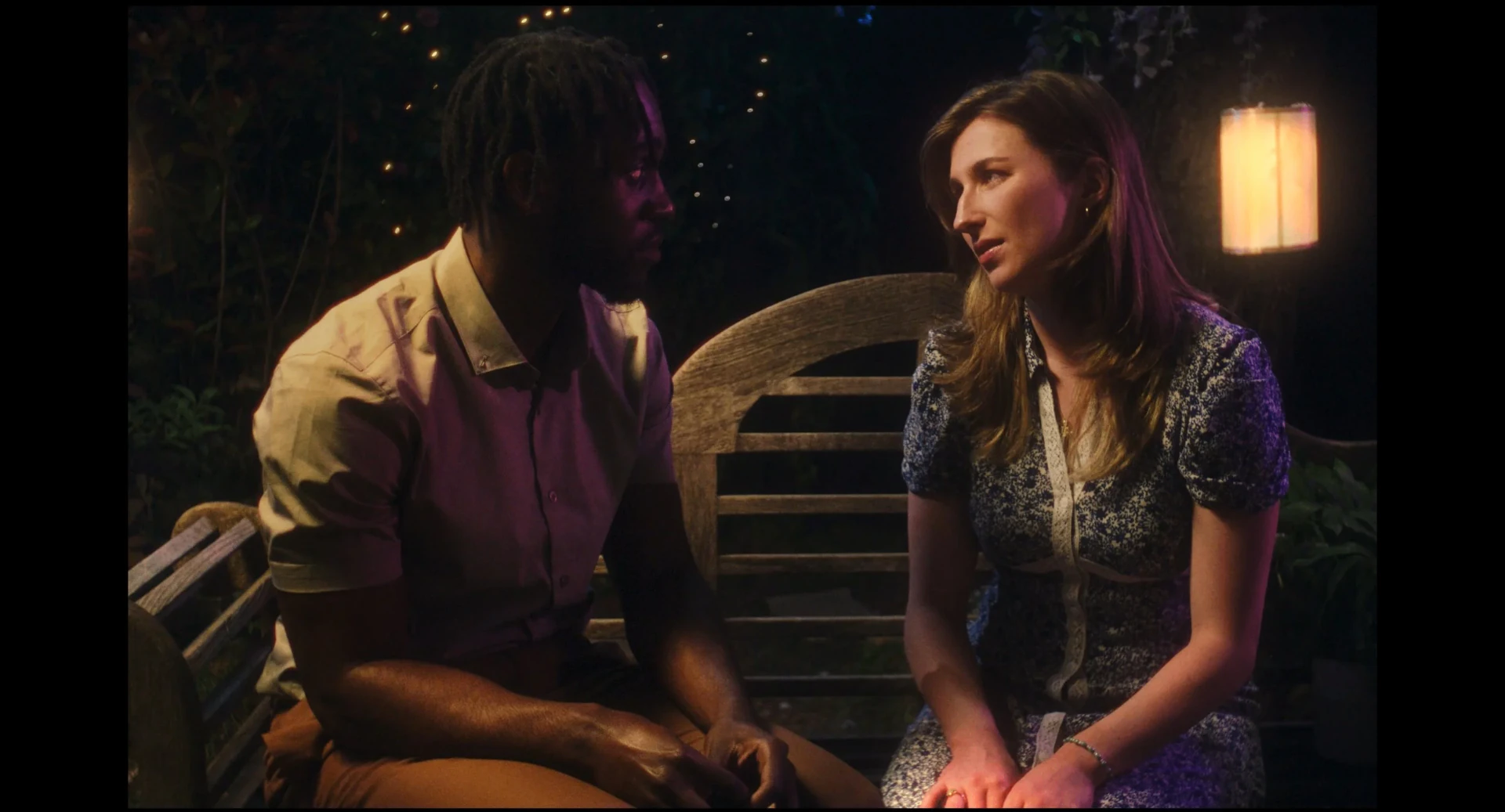 A Fig Story — two characters on a garden bench at night